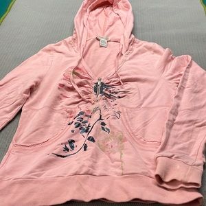 Pink hoodie with graffiti detail